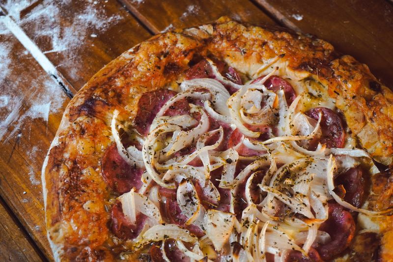 BBQ Chicken marco pizza with grilled chicken and caramelized onions