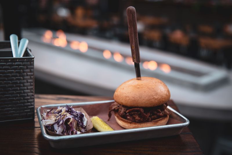 BBQ Pulled Pork Sandwich with house coleslaw and pickles