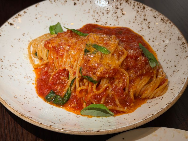 Spaghetti Bolognese with slow-cooked meat sauce and fresh parmesan