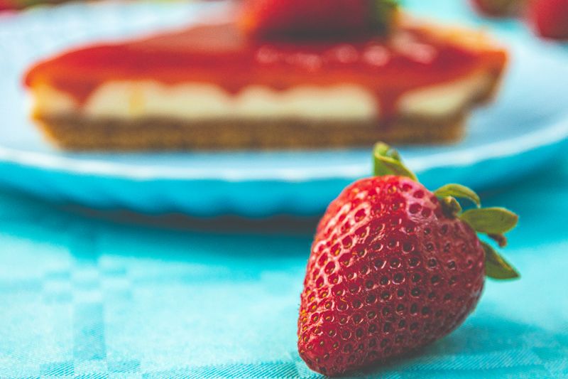 New York Cheesecake slice with strawberry compote topping